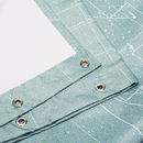 Personalised shower curtain eyelets hanging from bar