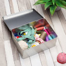 interior details of sewing storage box with sewing accessories