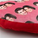 cushion in a heart shape with face print