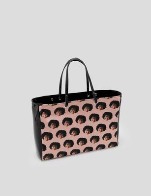 Handbag with face