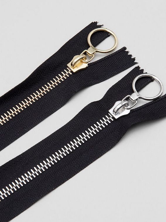 clutch met zilver of goudkleurige rits