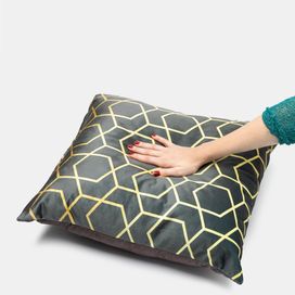 bespoke cushions on gold chair