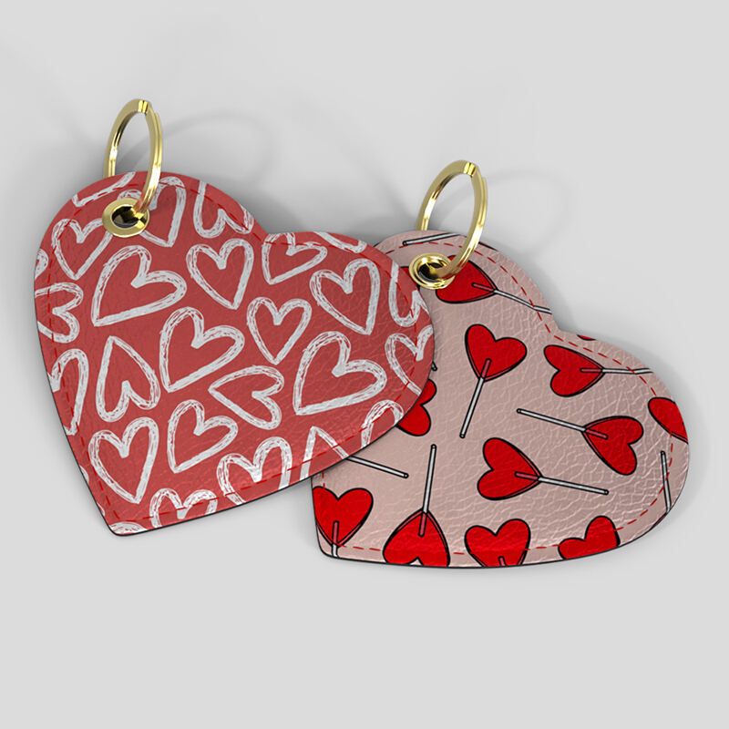 designer heart shaped keyring with gold rings
