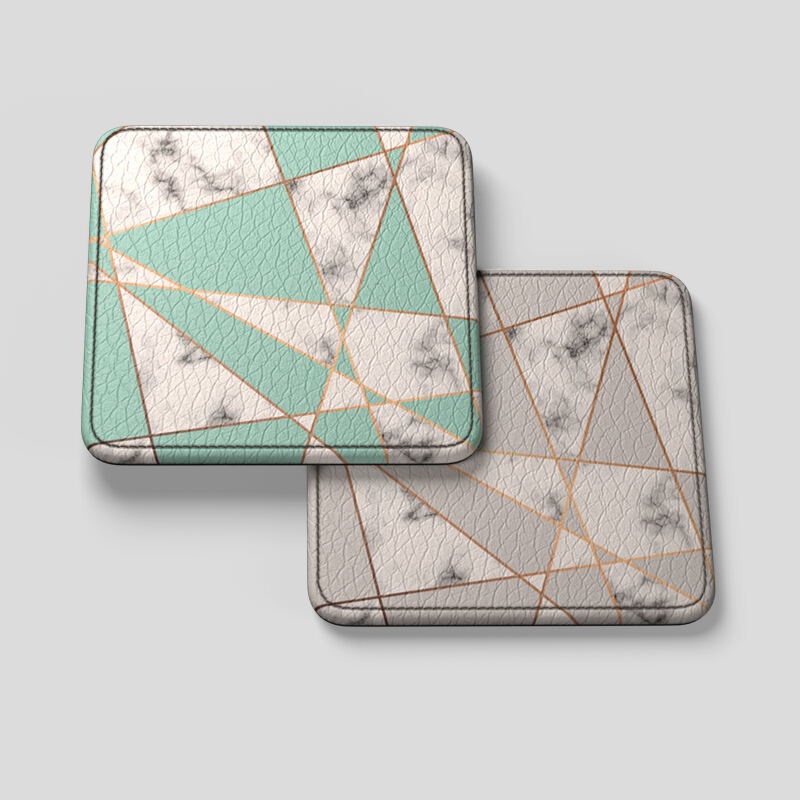 Four square leather coasters printed with abstract art