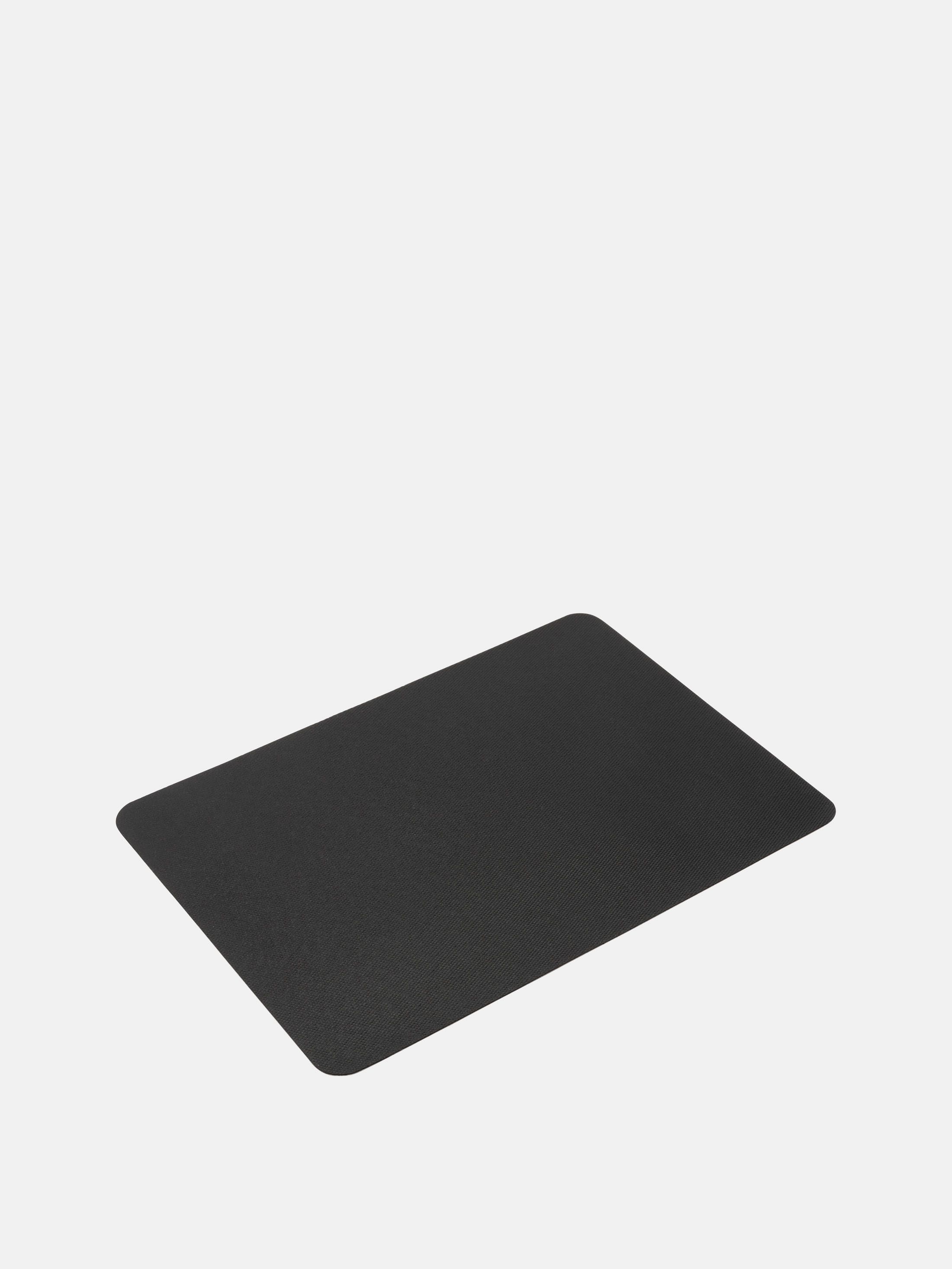 reverse side of the custom pet mat showing the black nonslip rubber