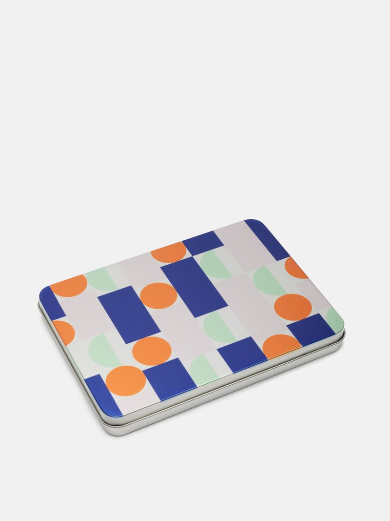 customised tin box with geometric colour pattern