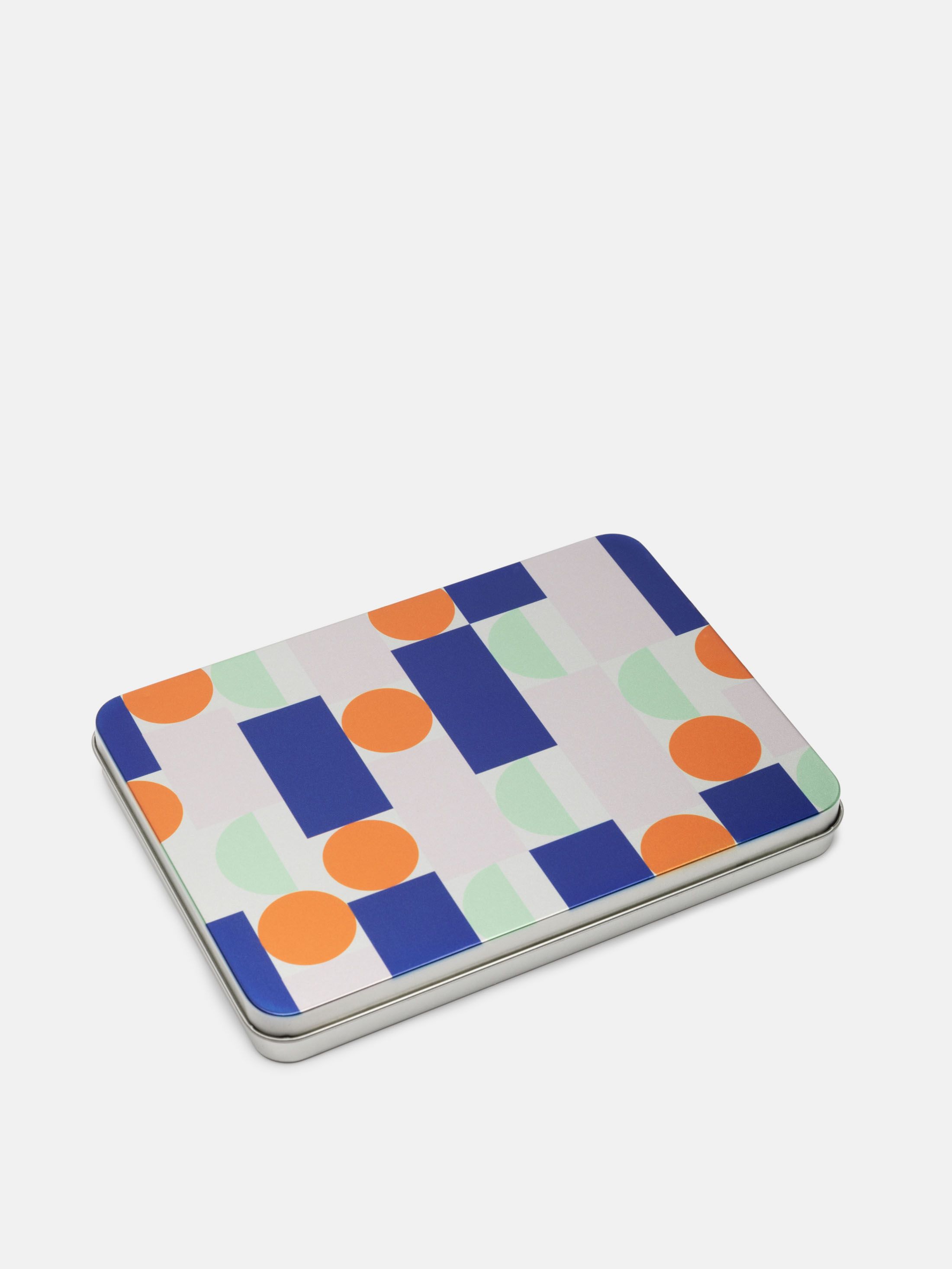 customized tin box with geometric color pattern