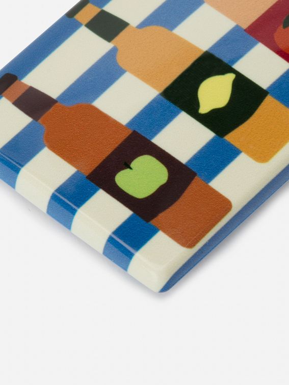 fridge magnets with floral design in orange and blue tones