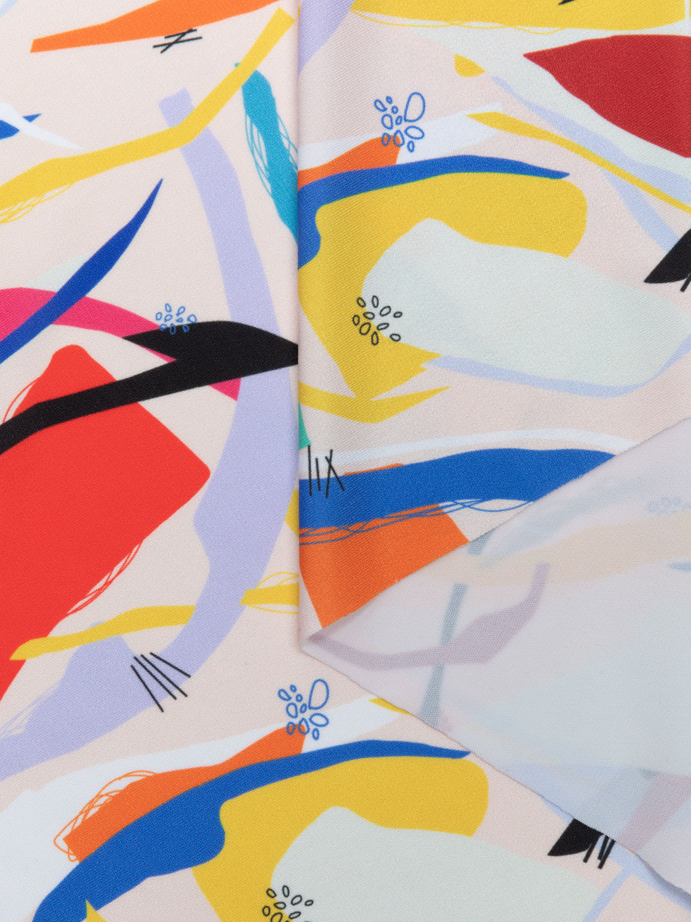 Detailed close-up of custom printed solange silk jersey