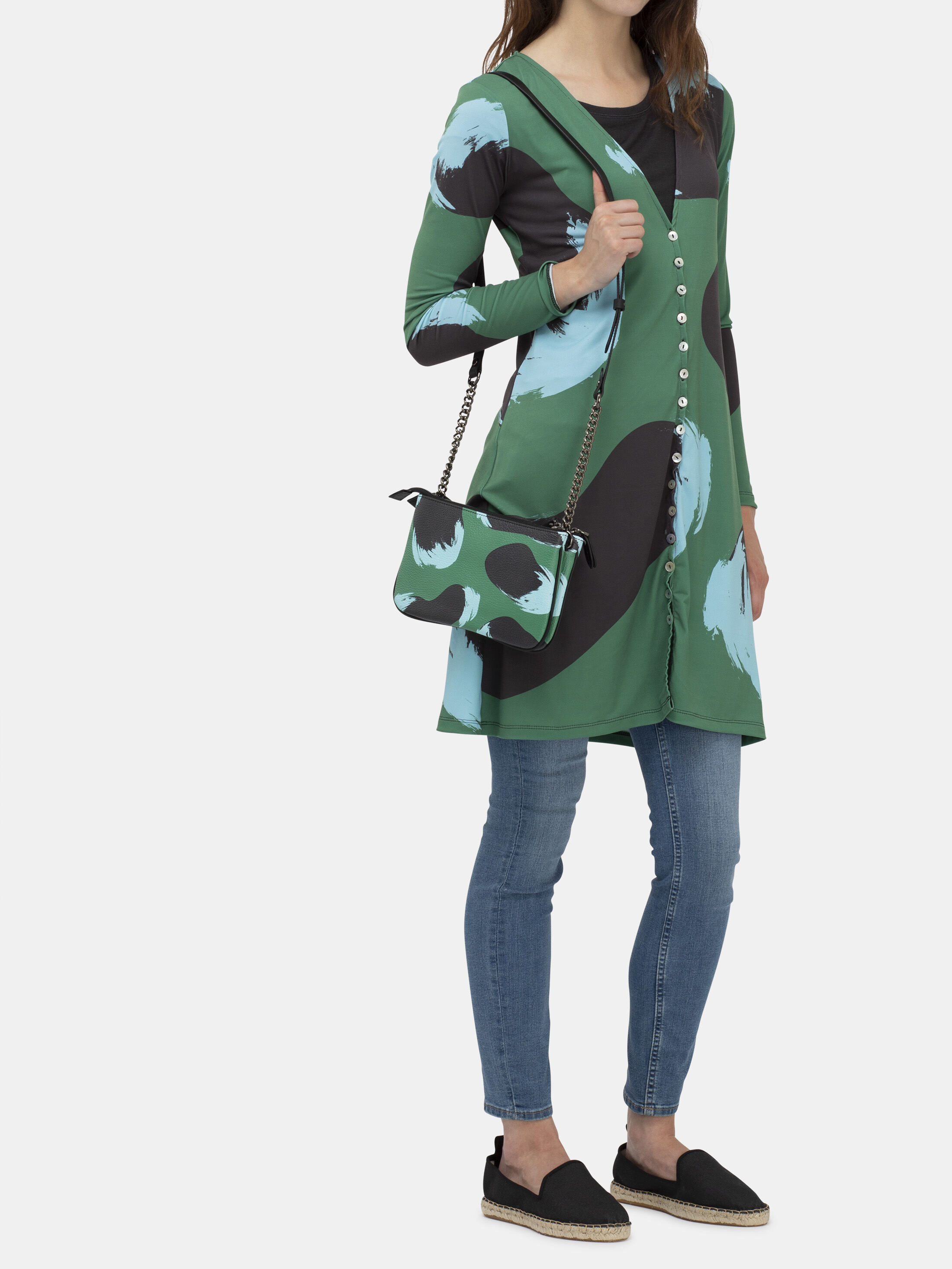 tryck på pochetteväska