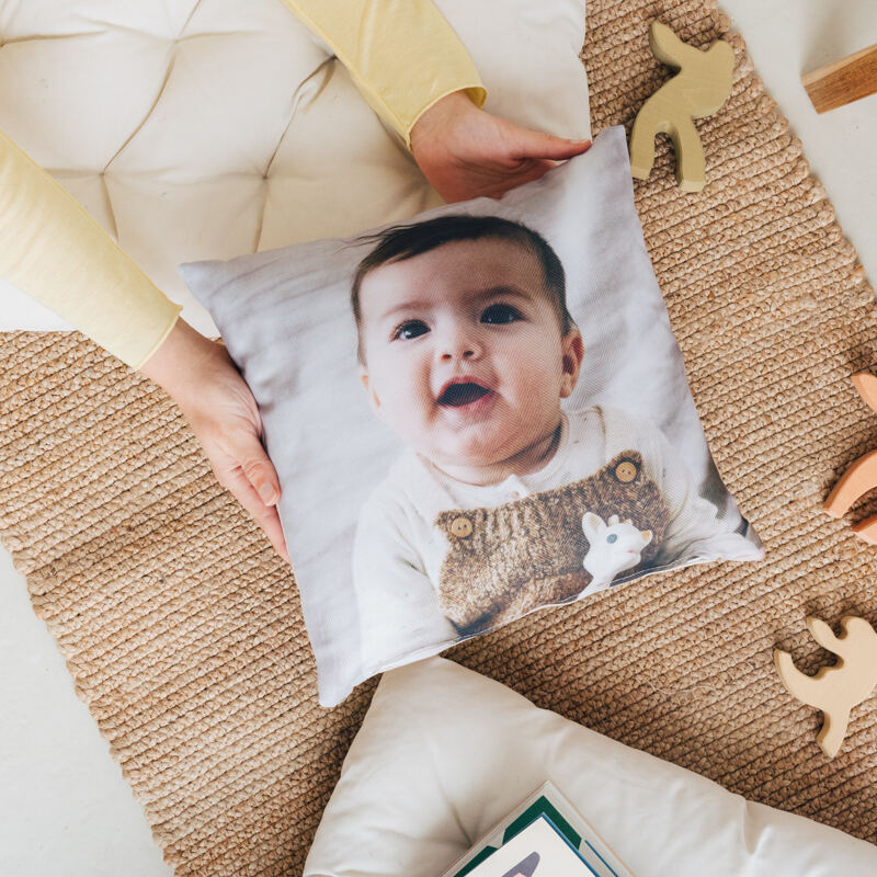 Throw pillows with store pictures on them