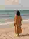 Custom floral kaftan beach shot
